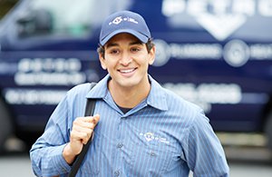 petro home services employee in front of truck