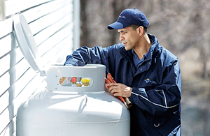 employee working on propane tank